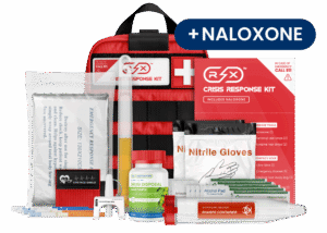 Red Crisis Response Kit with naloxone, nitrile gloves, alcohol pad, and sharps container displayed