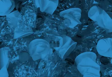 Pharmaceutical bottles in blue liquid showing environmental medication disposal impact.